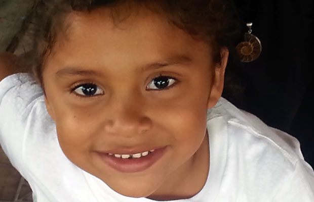 young girl looking at camera